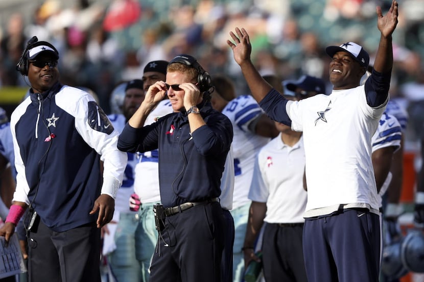 Dallas Cowboys defensive end DeMarcus Ware (94) celebrates behind Dallas Cowboys head coach...