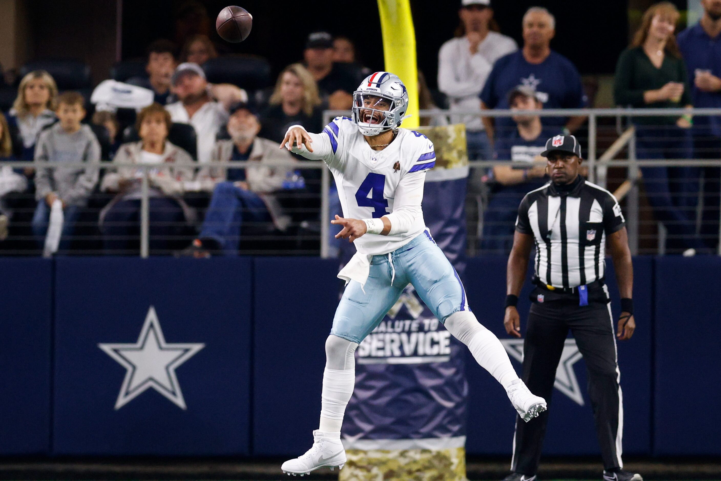 Dallas Cowboys quarterback Dak Prescott (4) throws a pass during the first half of an NFL...