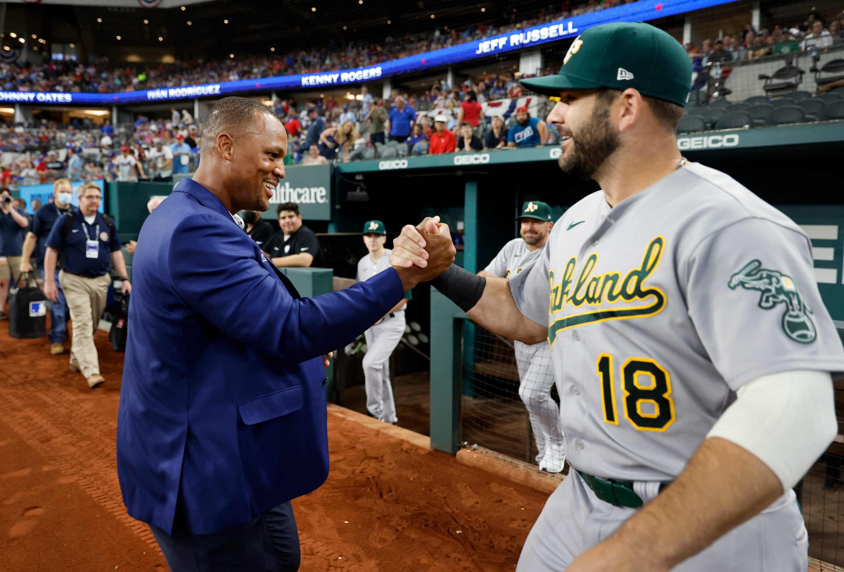 Former Texas Rangers third baseman Adrian Beltre is congratulated on his Texas Rangers...