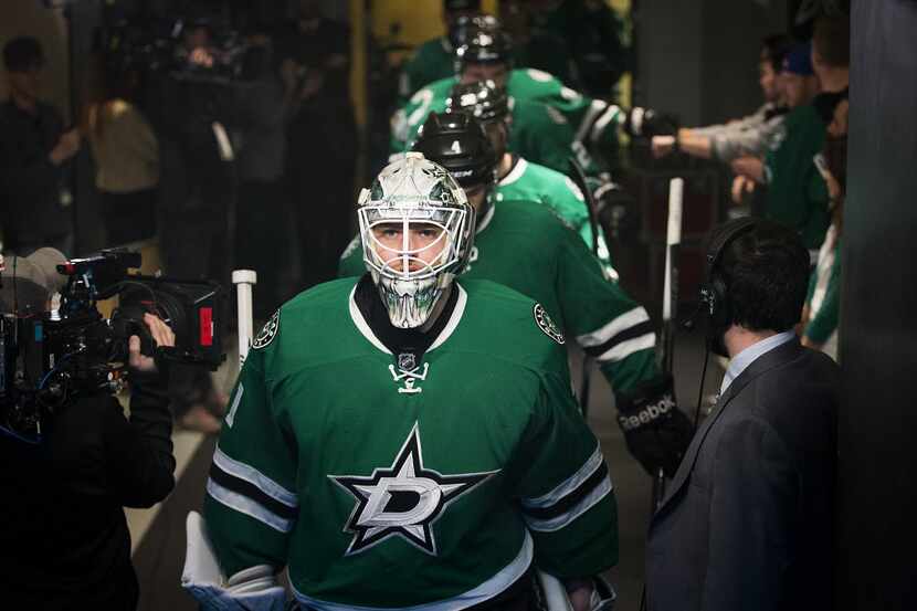 Dallas Stars goalie Antti Niemi (31) leads the team to the ice before facing the Calgary...