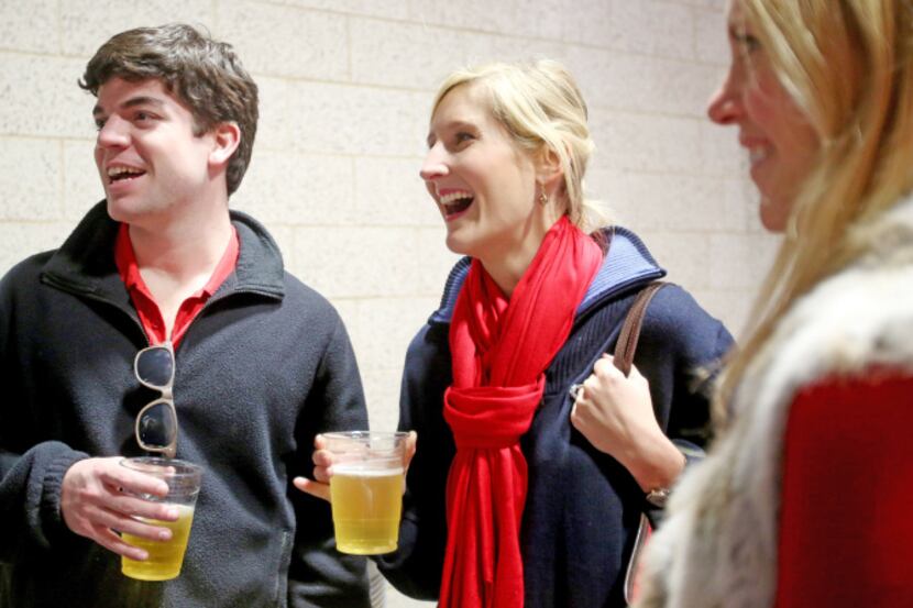 David Huckaby, Paige Phillips (center) and Heather Cole were part of the reopening of Moody...