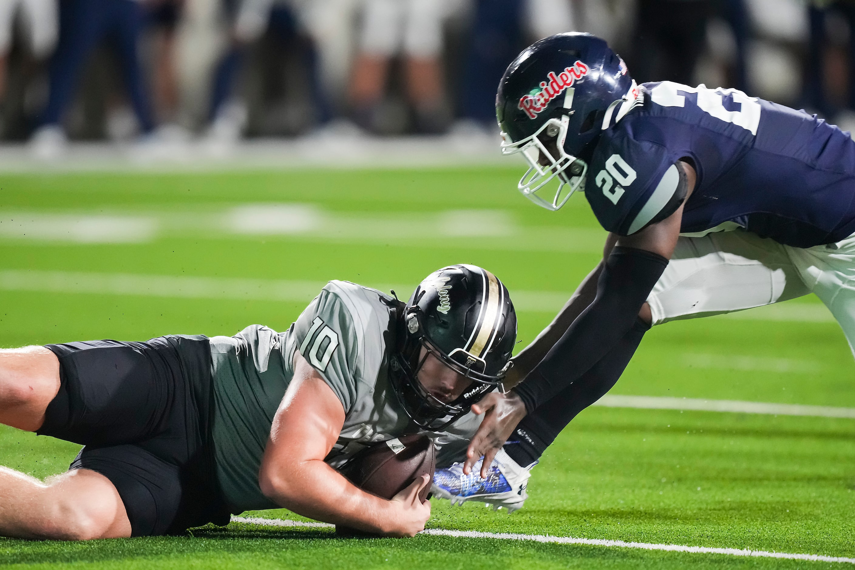 The Colony quarterback Carson Cox (10) recovers his own fumble as Denton Ryan defensive...