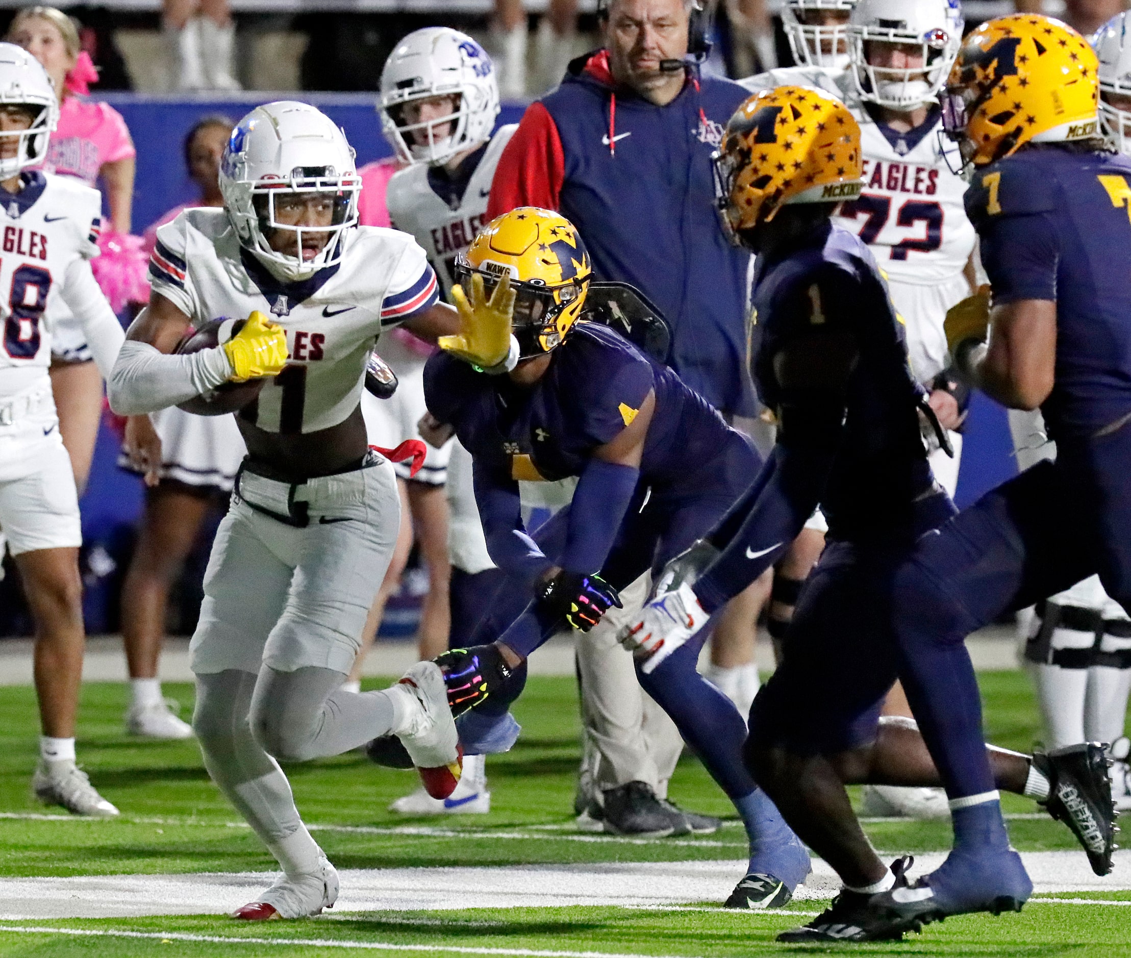 Allen High School wide receiver Donnell Gee Jr (11) runs after a catch during the first half...