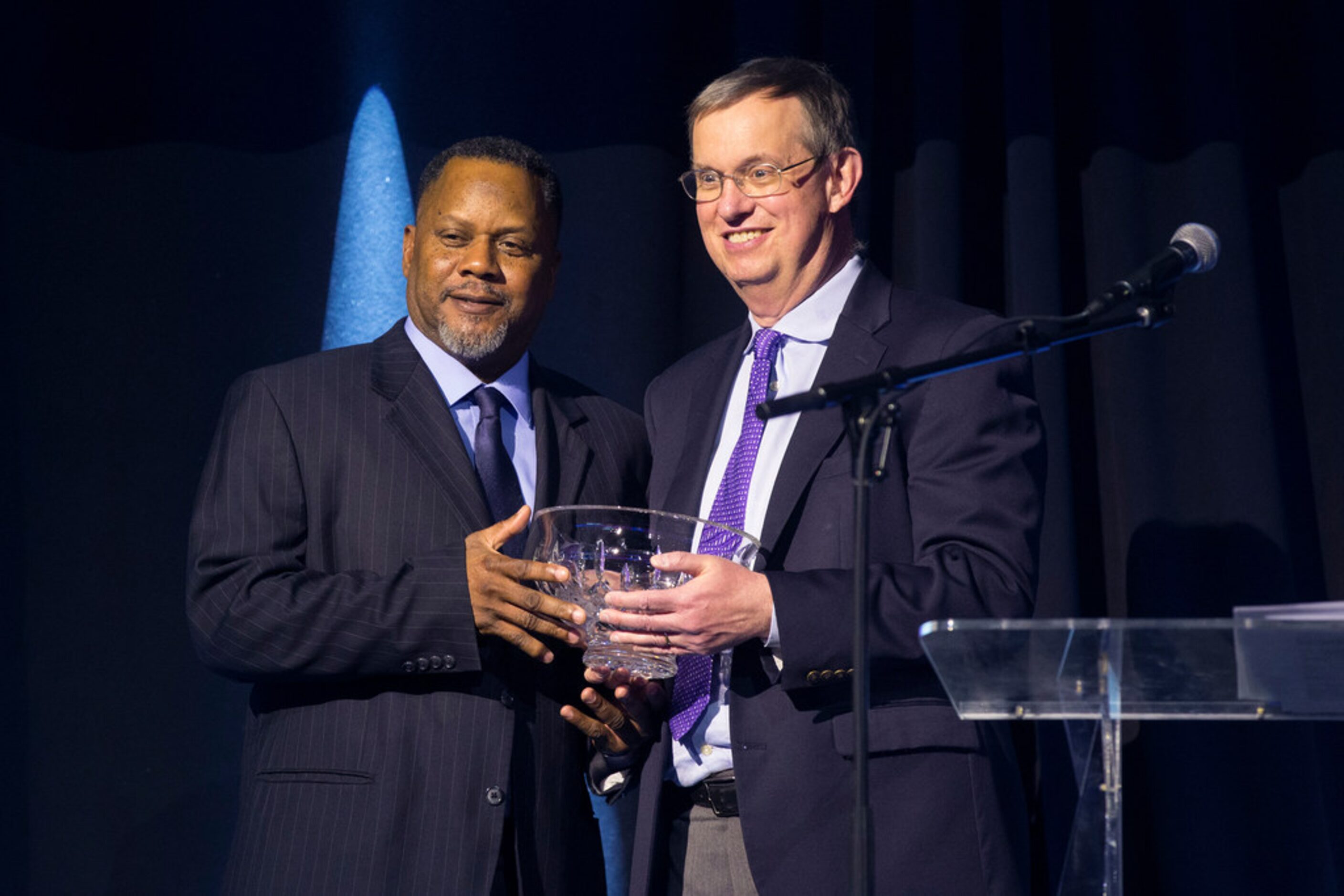 Chris Wilkerson, 2019 Mark Holtz Texas Rangers Alumni Award winner, left, poses for pictures...