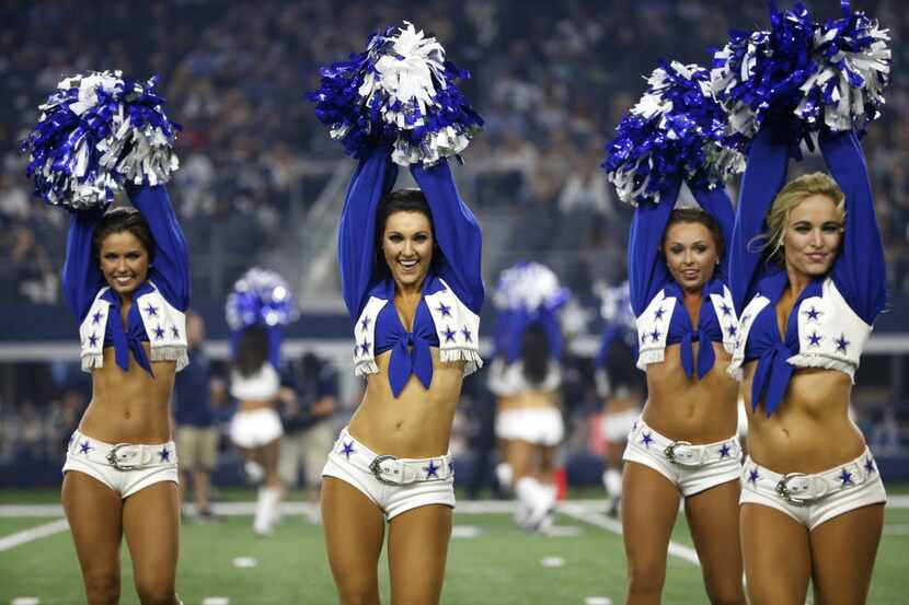The Dallas Cowboys cheerleaders perform during an NFL preseason football game against the...