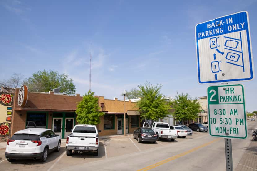 A back-in parking only sign on Hickory Street in Denton on Tuesday, Apr. 9, 2021.