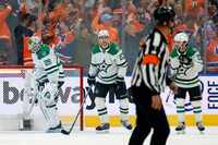 Dallas Stars goaltender Jake Oettinger (29) skates in front of his net after giving up a...