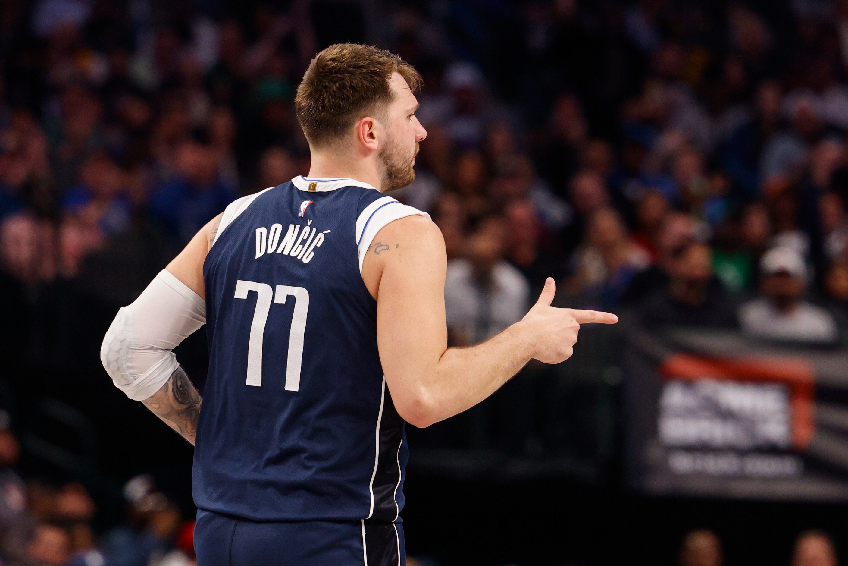 Dallas Mavericks guard Luka Doncic (77) celebrates a three-pointer during the second half of...