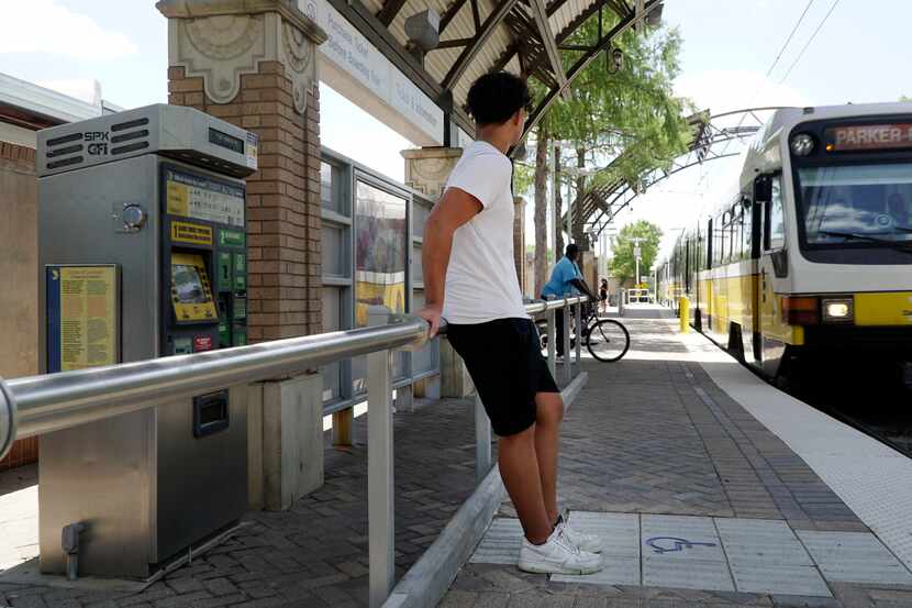 Sixteen-year old Jordan Sanchez stands at the Tyler/lVernon Dart Station to catch the train...