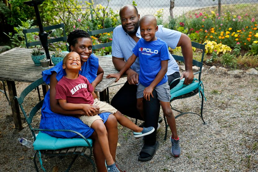 April Allen with her husband, Sean and their sons August (right) and Ellis at their Oak...