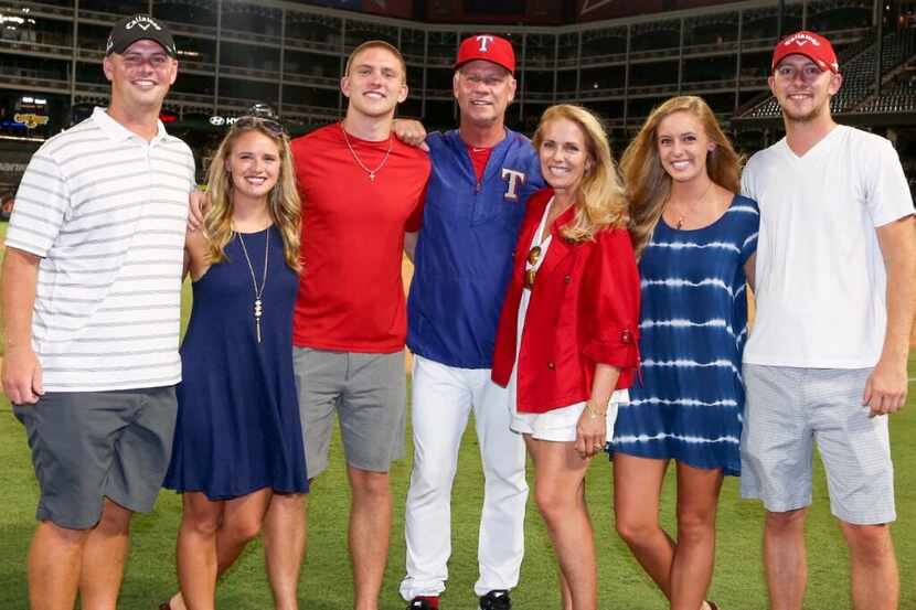 photo taken at Globe Life Park of Steve and Nancy Buechele and their five kids)    IDs L-R:...