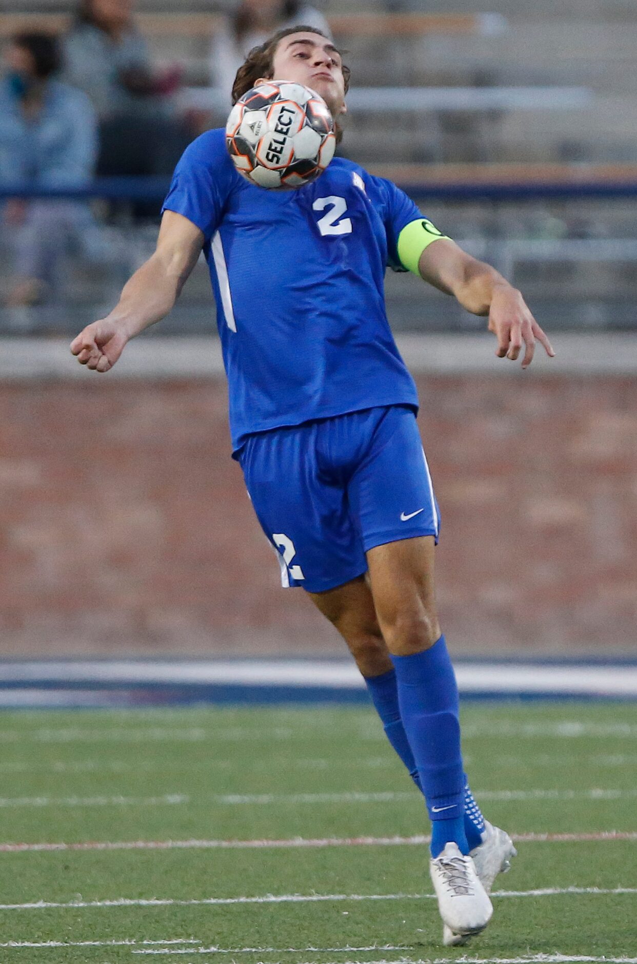 Allen defender Chse Duhon (2) controls the soccer ball during the first half as Allen High...