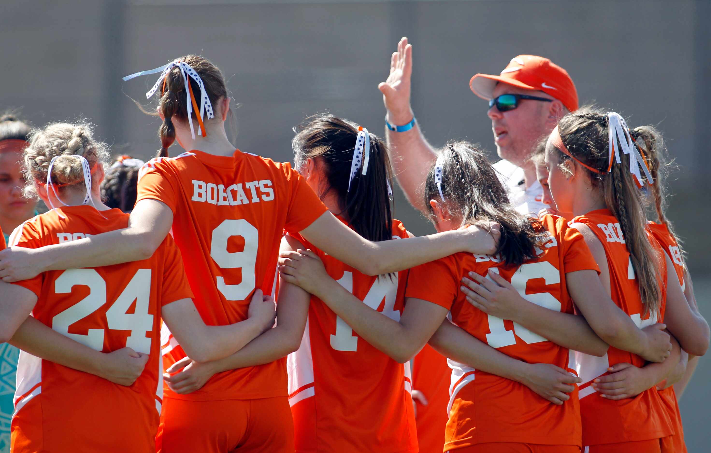 Celina head coach Alexander Adams gives last minute instructions to his players before the...