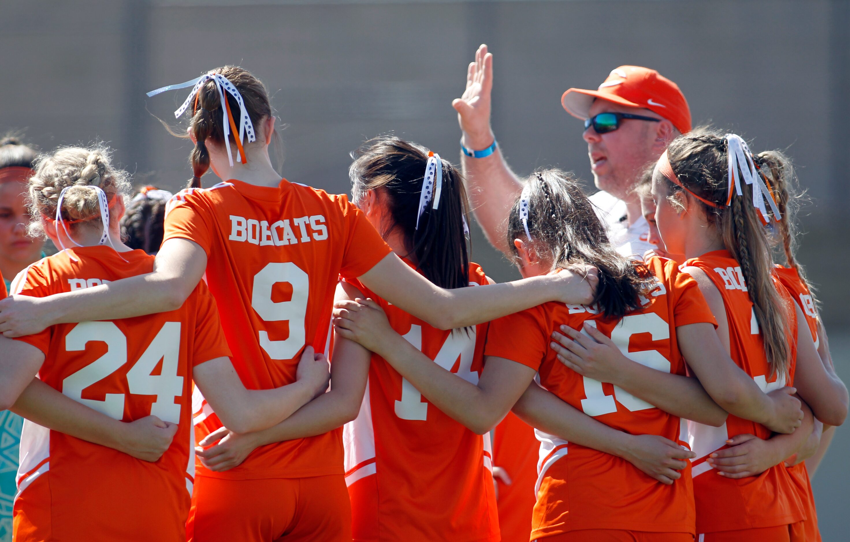 Celina head coach Alexander Adams gives last minute instructions to his players before the...