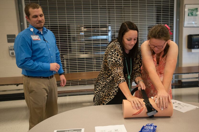 UT Health East Texas paramedic Tracy Sims oversees Winona ISD elementary school counselor...