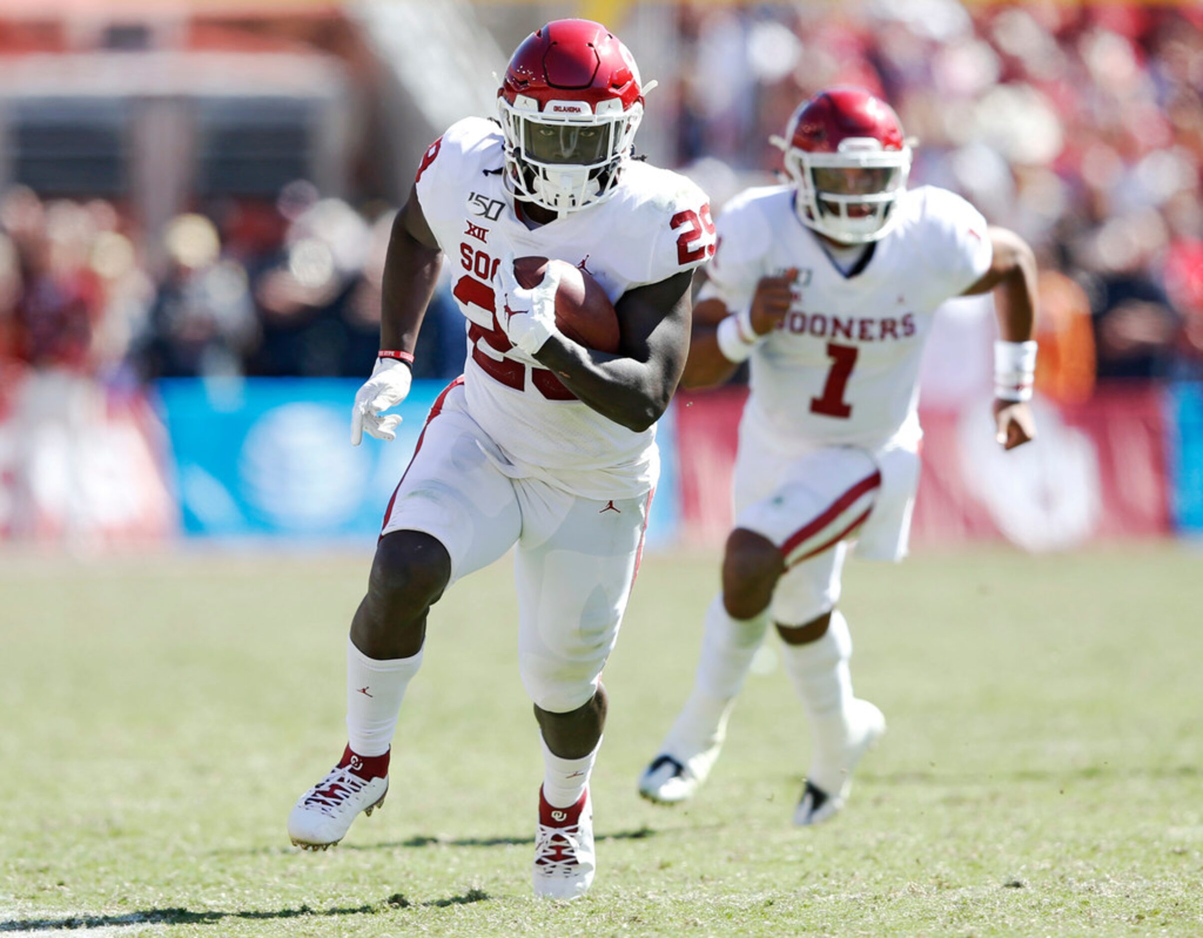 Oklahoma Sooners running back Rhamondre Stevenson (29) rushes up the field during the second...