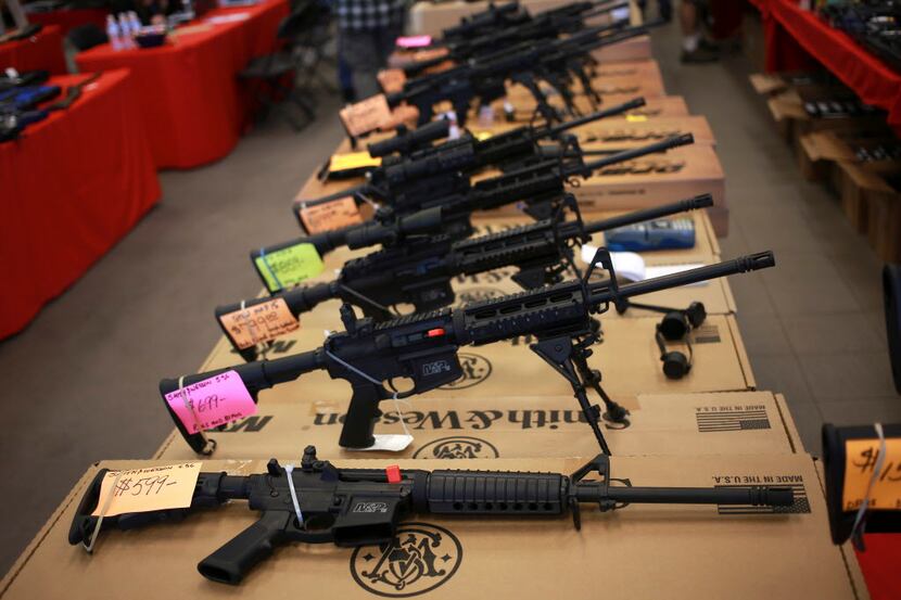  Smith & Wesson AR-15 rifles for sale at a gun show in Loveland, Colo., in 2014. (Luke...