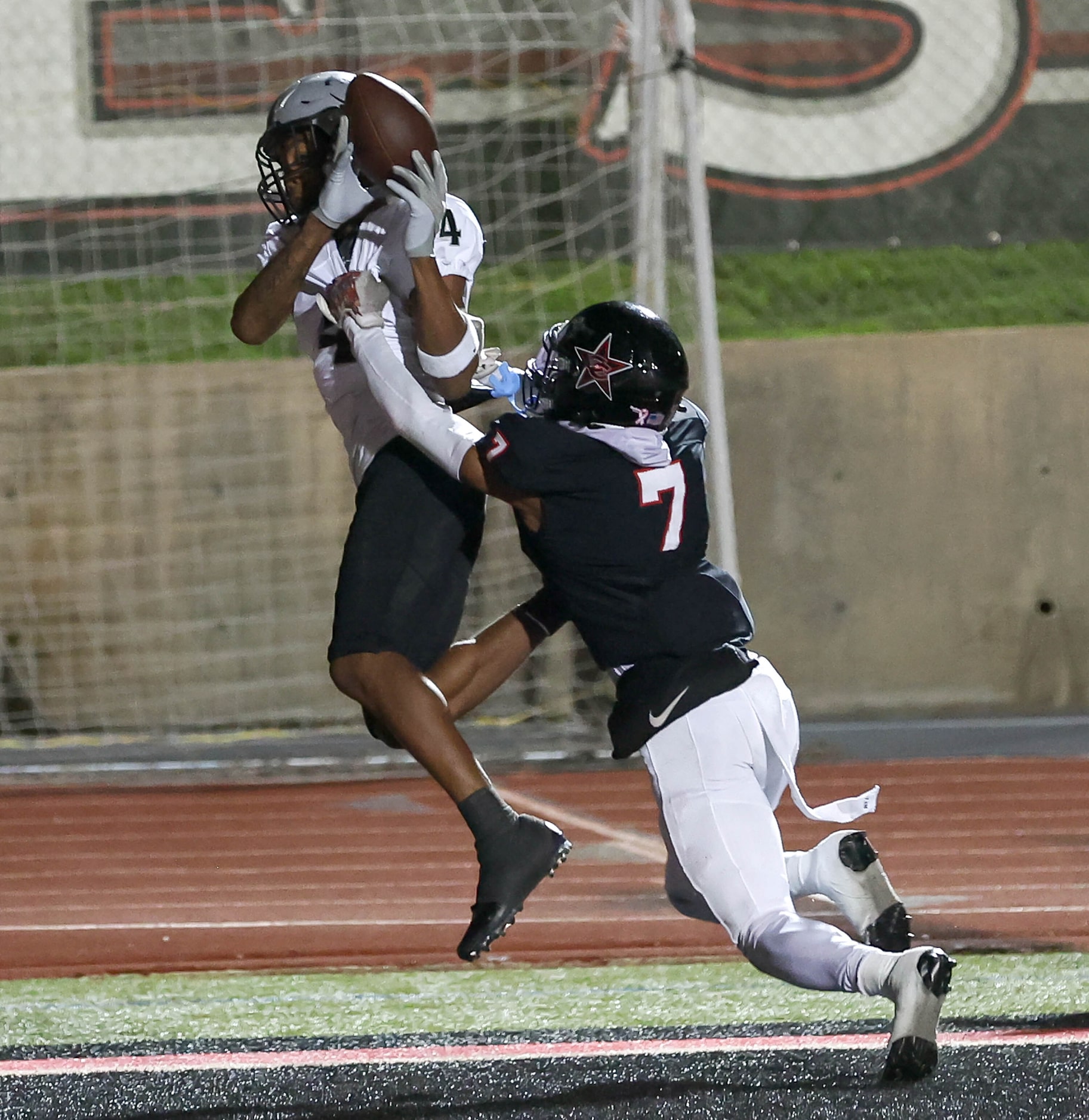 Denton Guyer wide receiver Josiah Martn (4) tries to come up with a reception against...