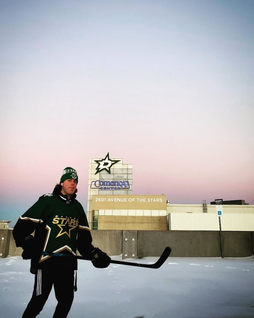 Dallas Stars fan Austin MacDonald poses in front of the Comerica Center in Frisco, Texas.