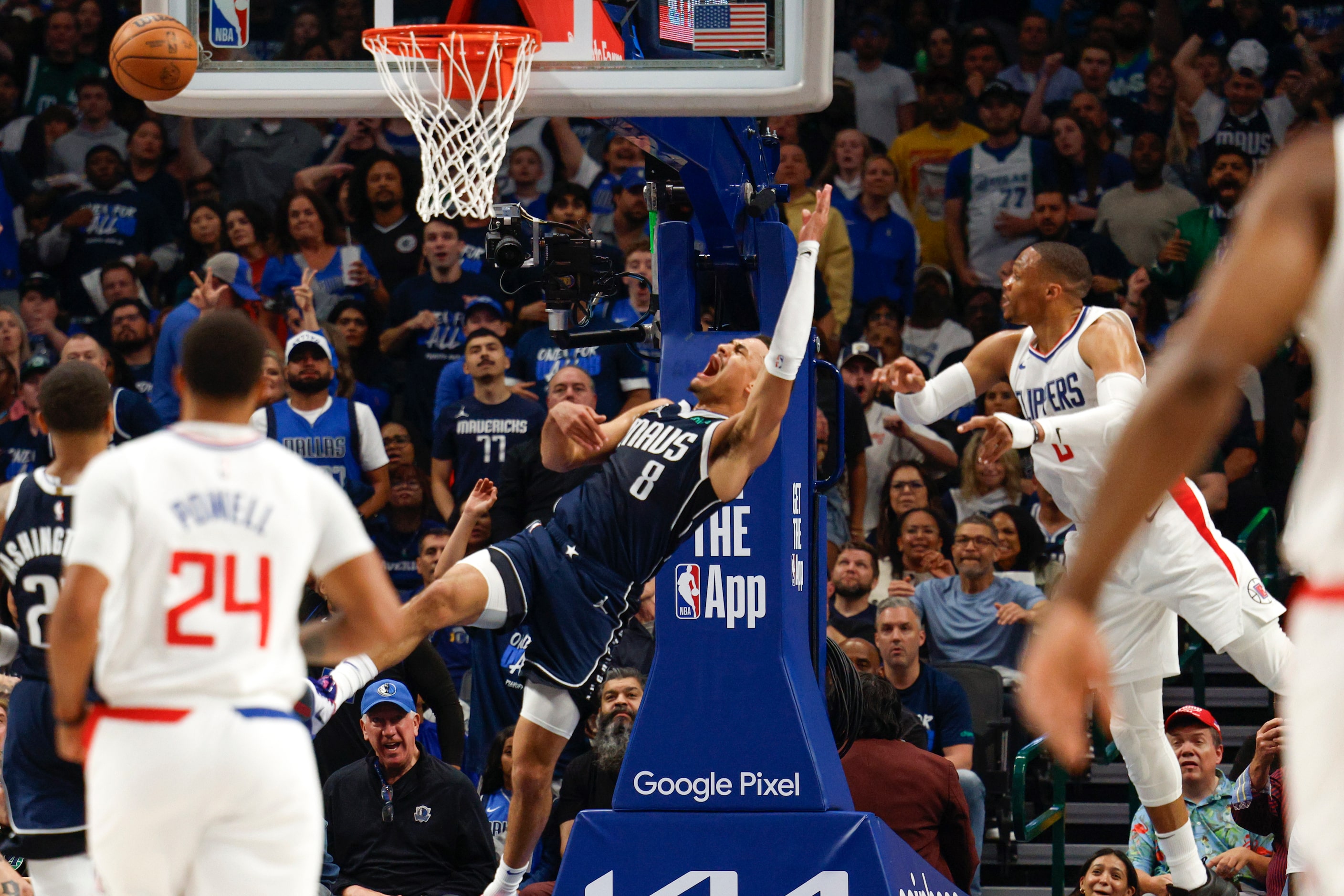 Dallas Mavericks guard Josh Green (8) reacts after being fouled attempting a dunk by \LA...