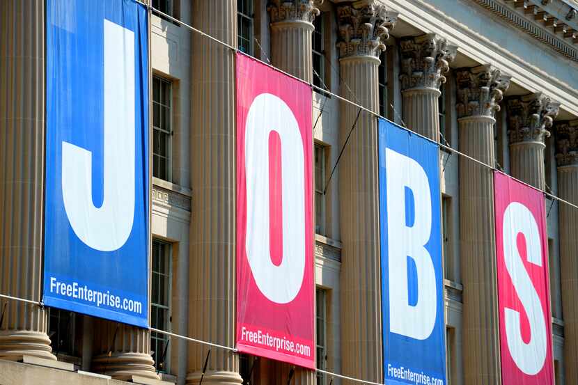 A large jobs sign is displayed above the U.S. Chamber of Commerce in Washington, D.C.