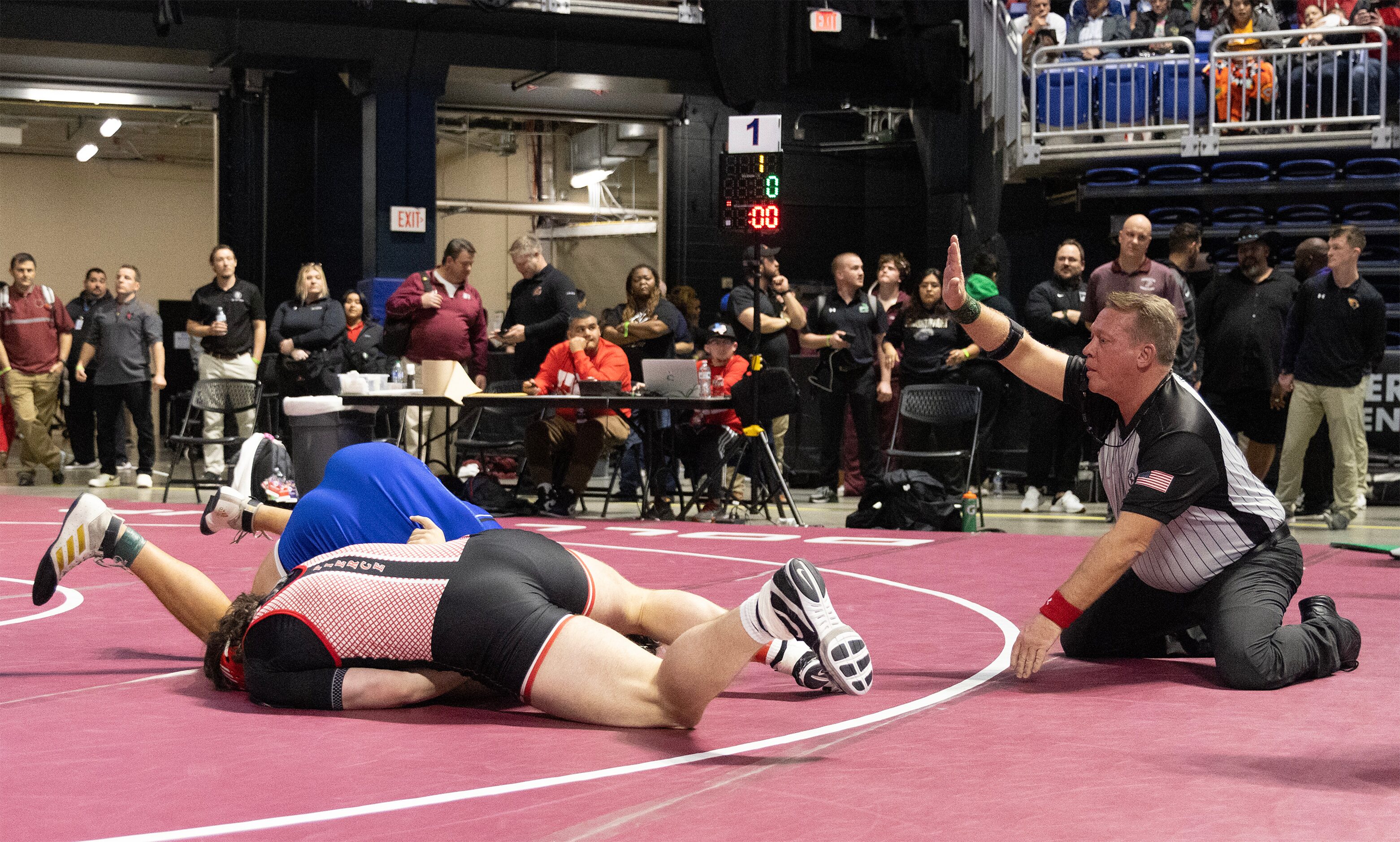 Payton Pierce from Lovejoy (left) wrestles Jack Ashley from Midlothian in the 5A boys 215...