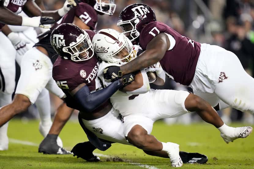 Mississippi State running back Seth Davis (23) is stopped at the line of scrimmage by Texas...