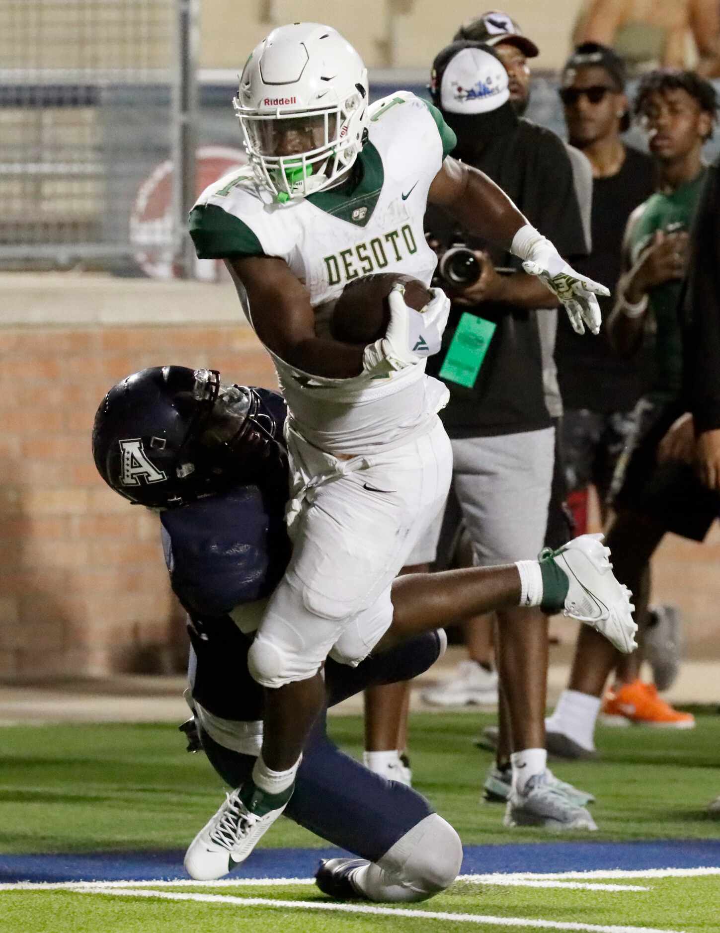 DeSoto High School running back Deondrae Riden jr. (1) carries the football inside the one...