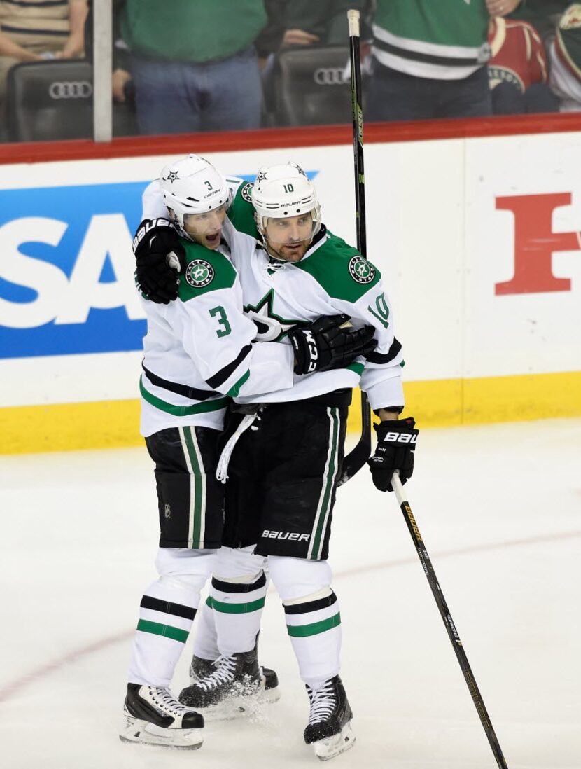 ST PAUL, MN - APRIL 24: John Klingberg #3 and Patrick Sharp #10 of the Dallas Stars...