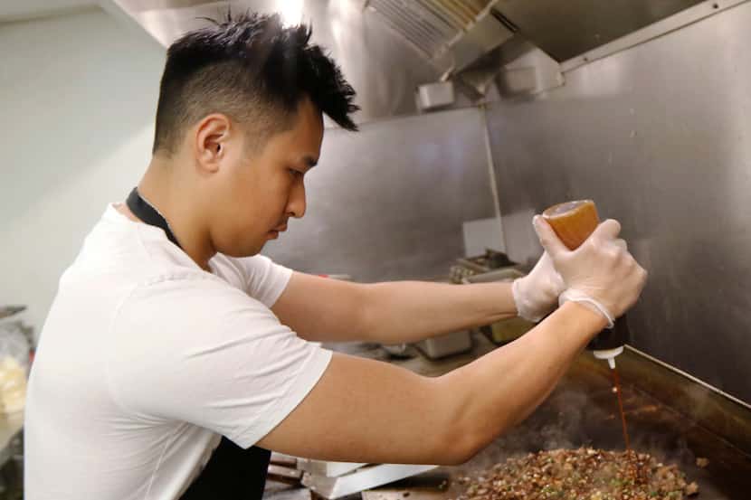Calvin Nguyen, founder and CEO of OMG Tacos, makes OMG steak tacos, the restaurant's most...