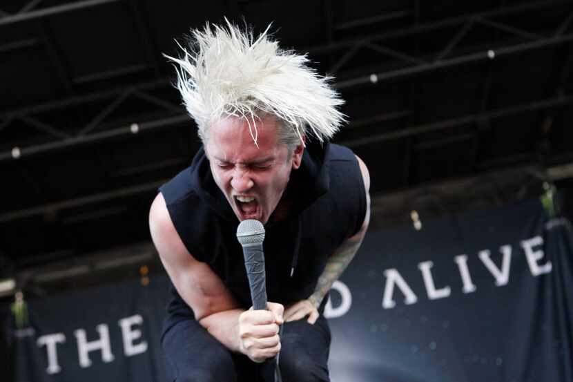 Lead singer Tyler Smith of the band The Word Alive performs at the the Vans Warped Tour, on...