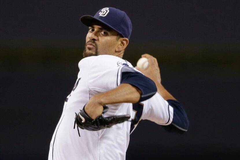 San Diego Padres starting pitcher Tyson Ross works against a San Francisco Giants batter...