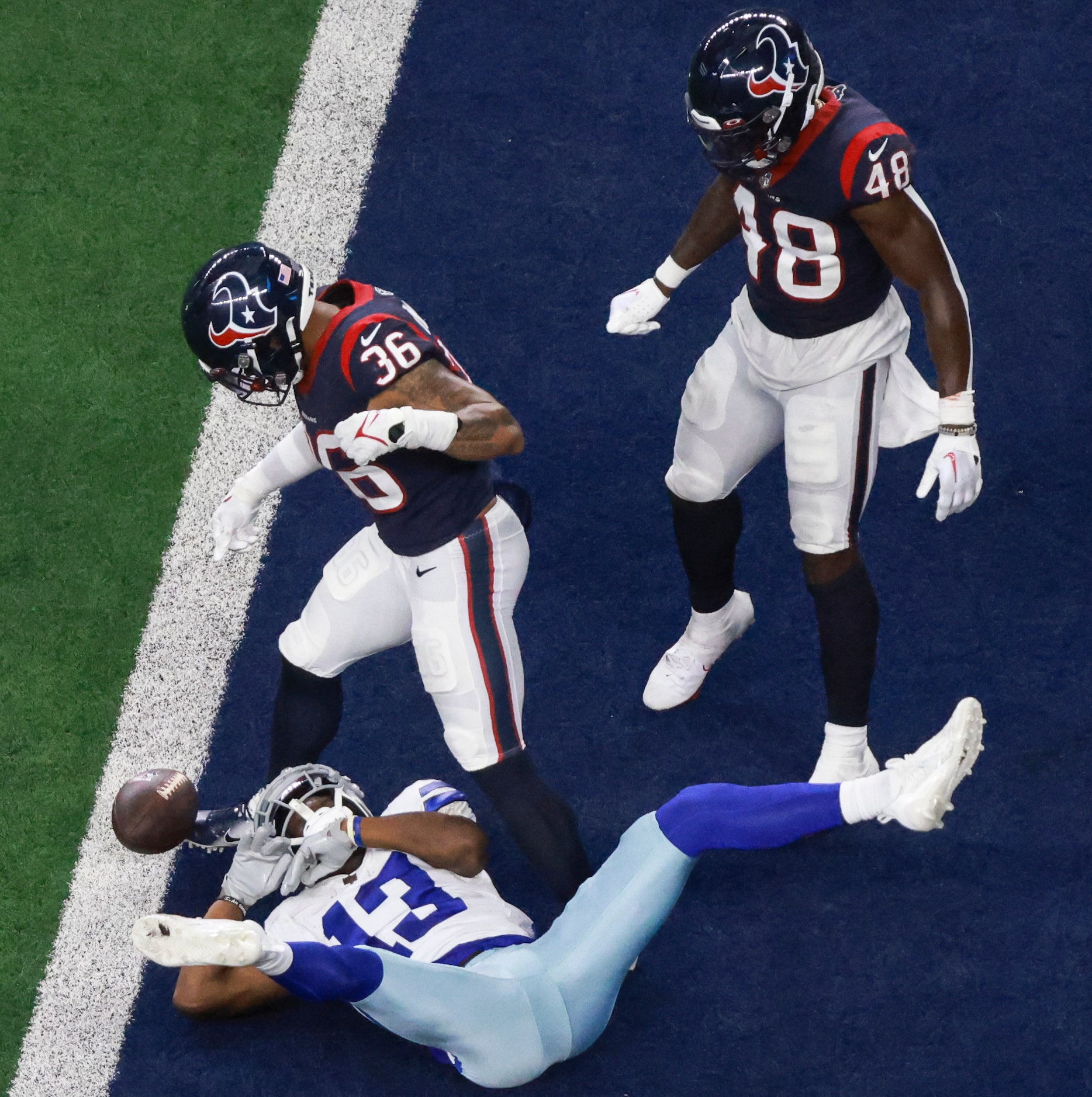 Dallas Cowboys wide receiver Michael Gallup (13) tries to hang onto the ball during an NFL...