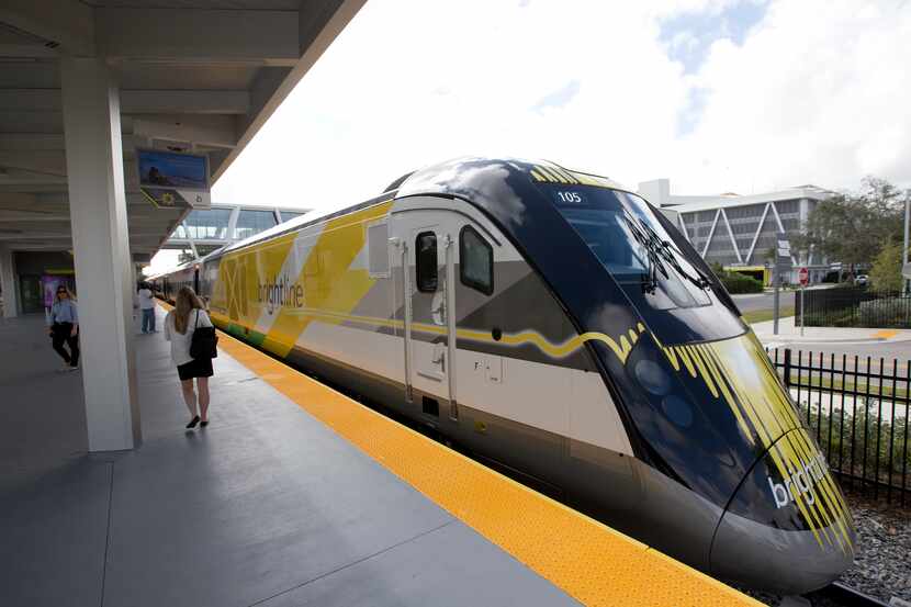 FILE - A Brightline train is shown at a station in Fort Lauderdale, Fla., on Jan. 11, 2018....