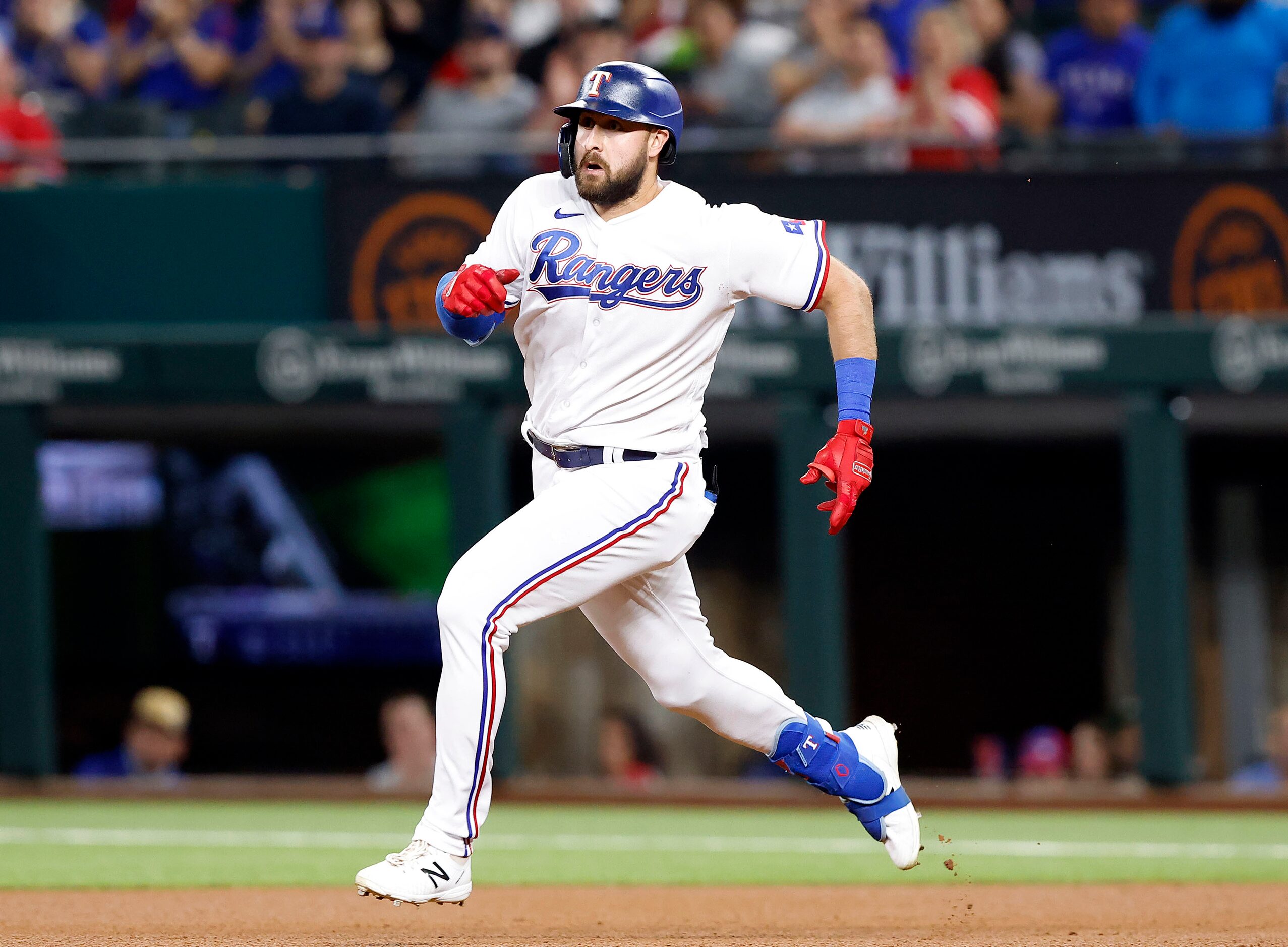 Texas Rangers center fielder Joey Gallo (13) races to second on a double down the line...