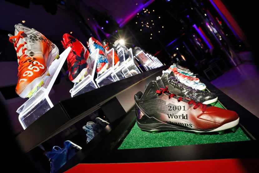 Under Armour cleats for MLB teams are on display during an Under Armour announcement event...