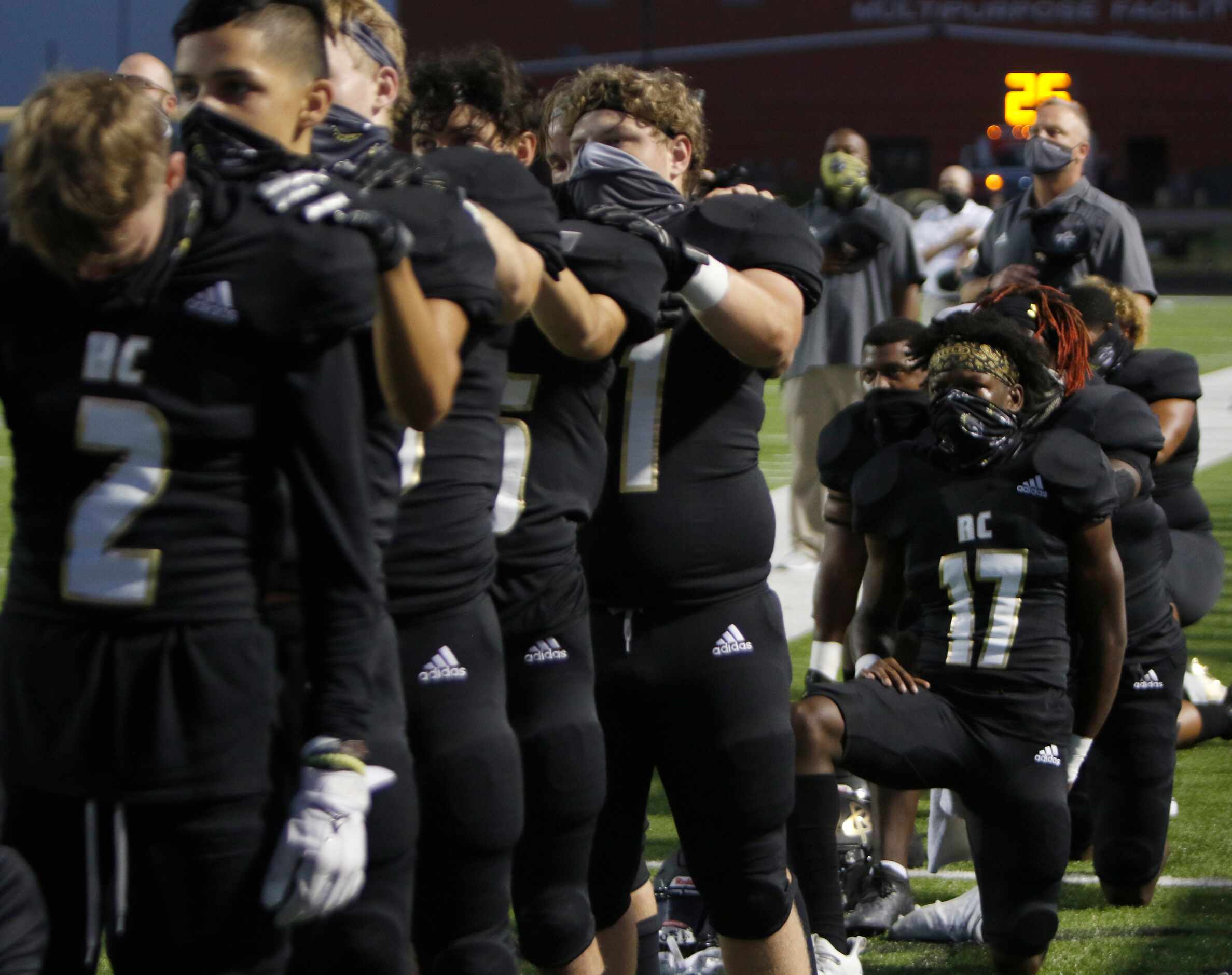 Royse City defensive back Jacoby Brown (17) is joined by other bulldogs teammates to take a...