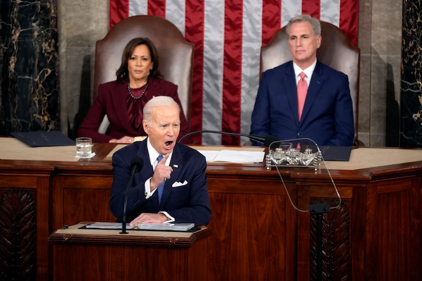 Vice President Kamala Harris and House Speaker Kevin McCarthy of Calif., listen as President...