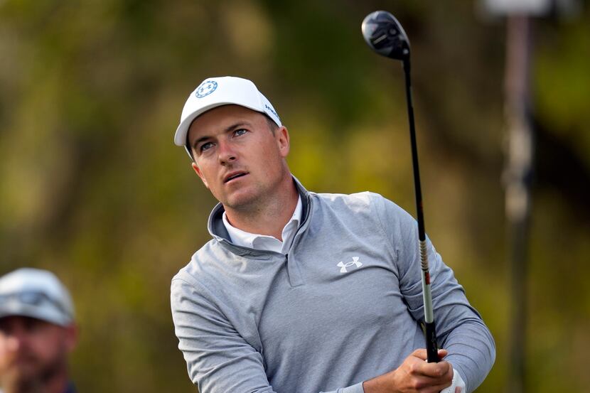 Jordan Spieth watches his tee shot on the 12th hole during the second round of the Players...