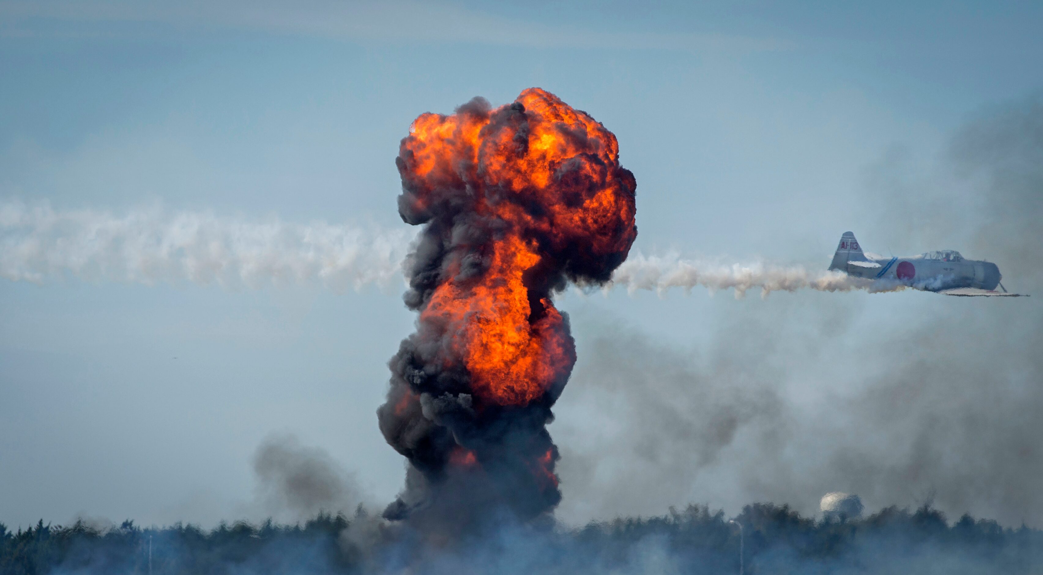 Explosions fills the sky during the Commemorative Air Force Wings Over Dallas WWII Airshow...