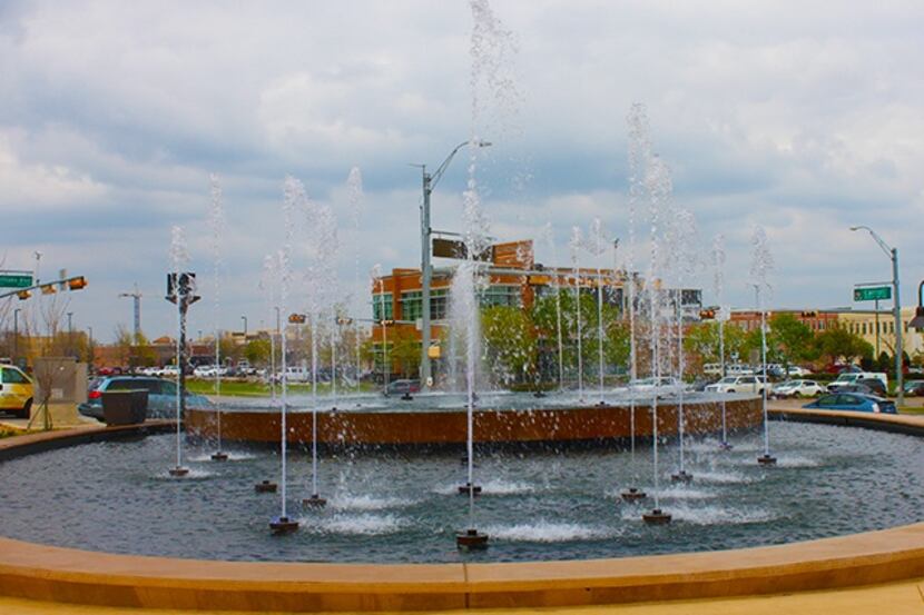 The Park Village fountain is seen here in earlier, happier times.