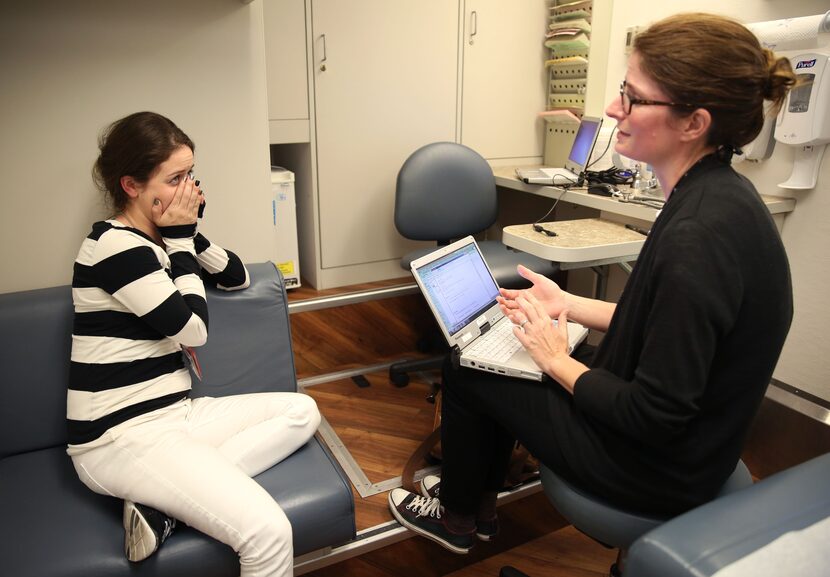 Monica Frasier reacts after hearing that she does not have cancer from Dr. Lara Johnson,...