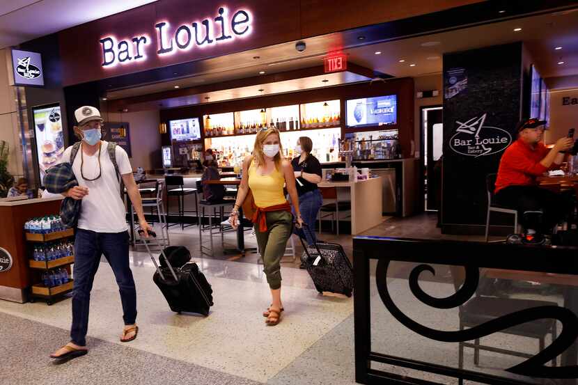 Bar Louie, owned by Paradies Lagardere, is located in Terminal D at DFW Airport and is shown...