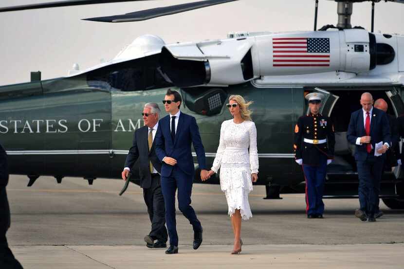 Jared Kushner and Ivanka Trump make their way to board Air Force One before departing Tel...