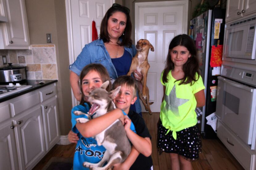 In her Frisco home, Kerri Steele joins her children (from left) Emma, Liam and Page. She...