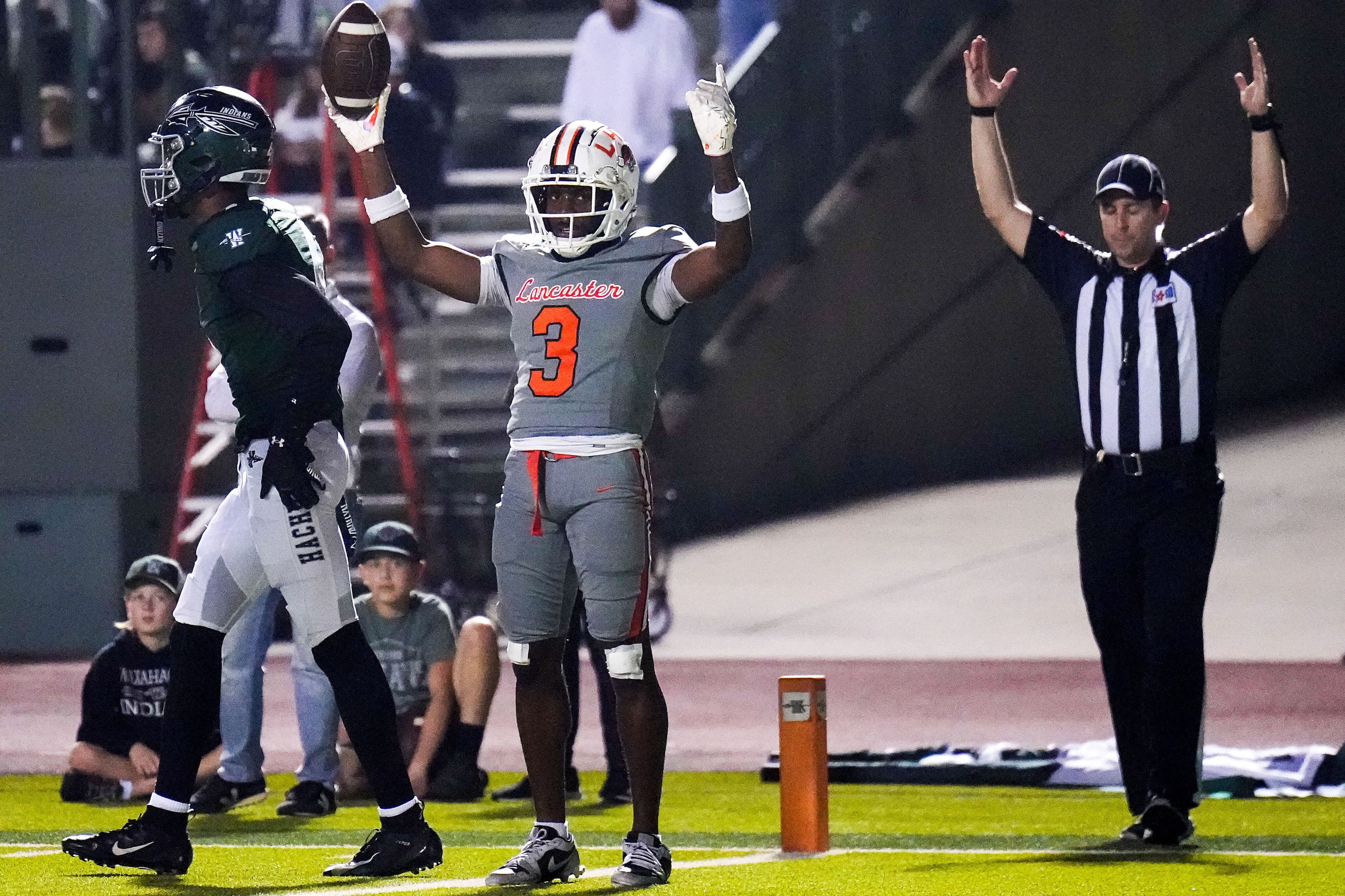 Lancaster quarterback Ja'Quavius Pipkin (3) celebrates after catching a touchdown pass...