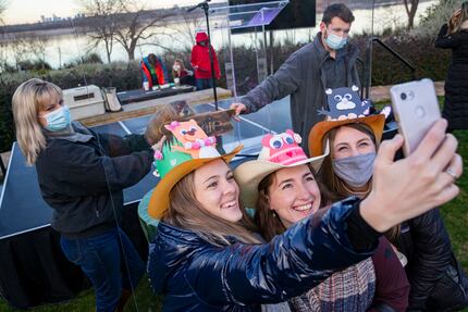 Linsey Peterson (from left), Emma Ingram and Shelby Springer take a selfie with Arboretum...