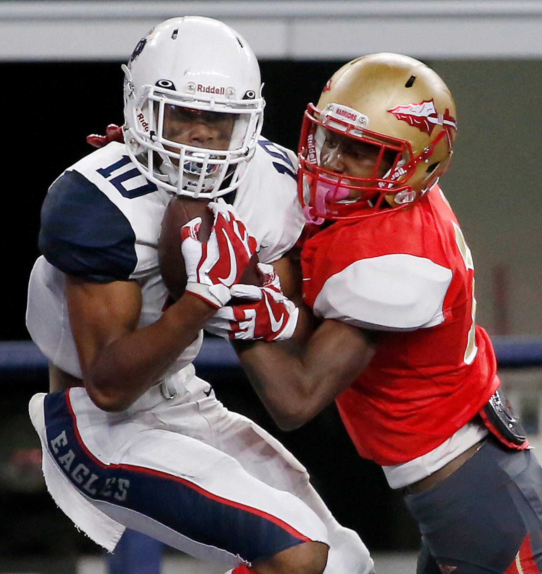 Allen's Theo Wease (10) holds onto a touchdown pass against South Grand Prairie's Kenneth...