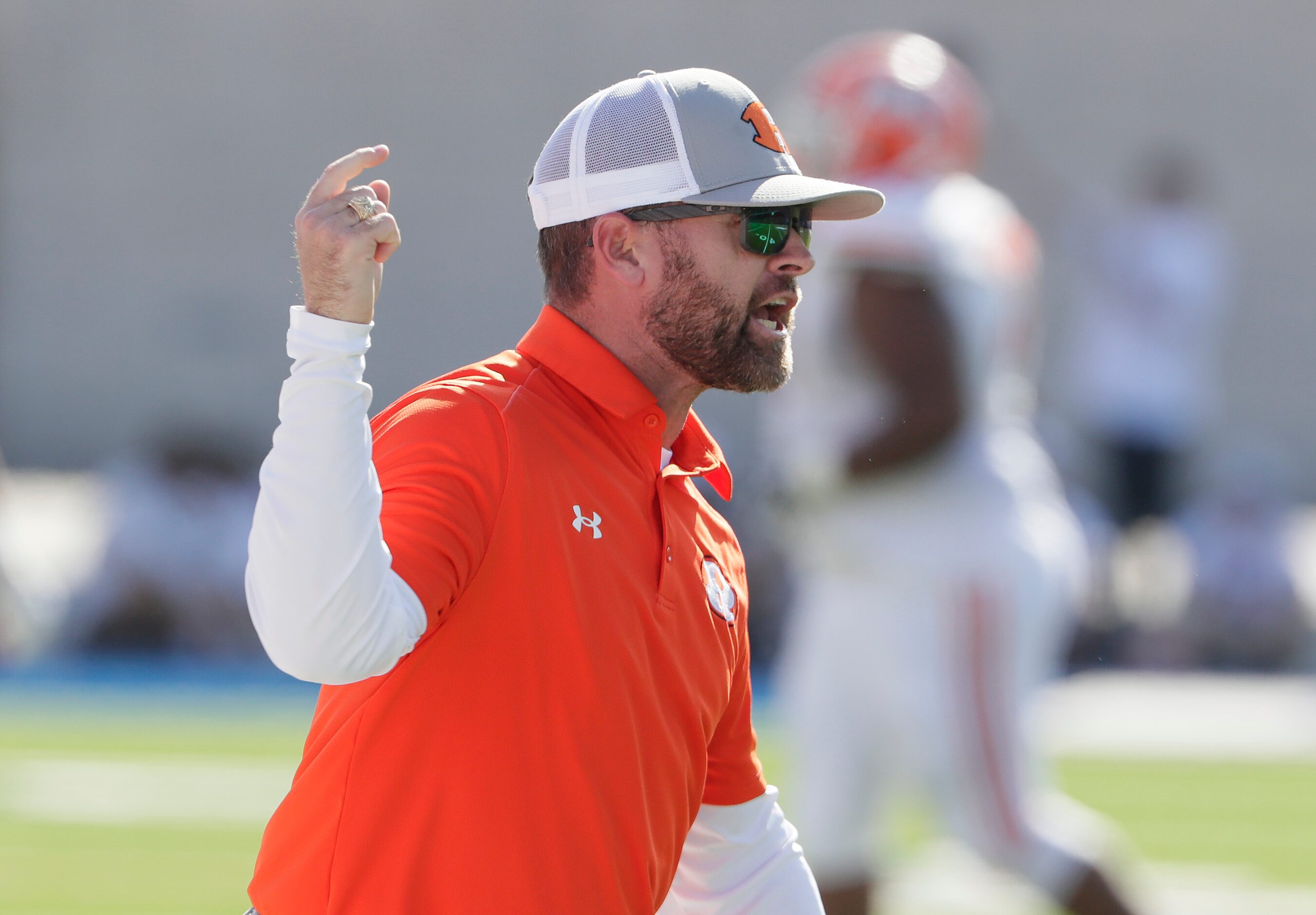 Rockwall High School head coach Trey Brooks contests a no call during the first half as...