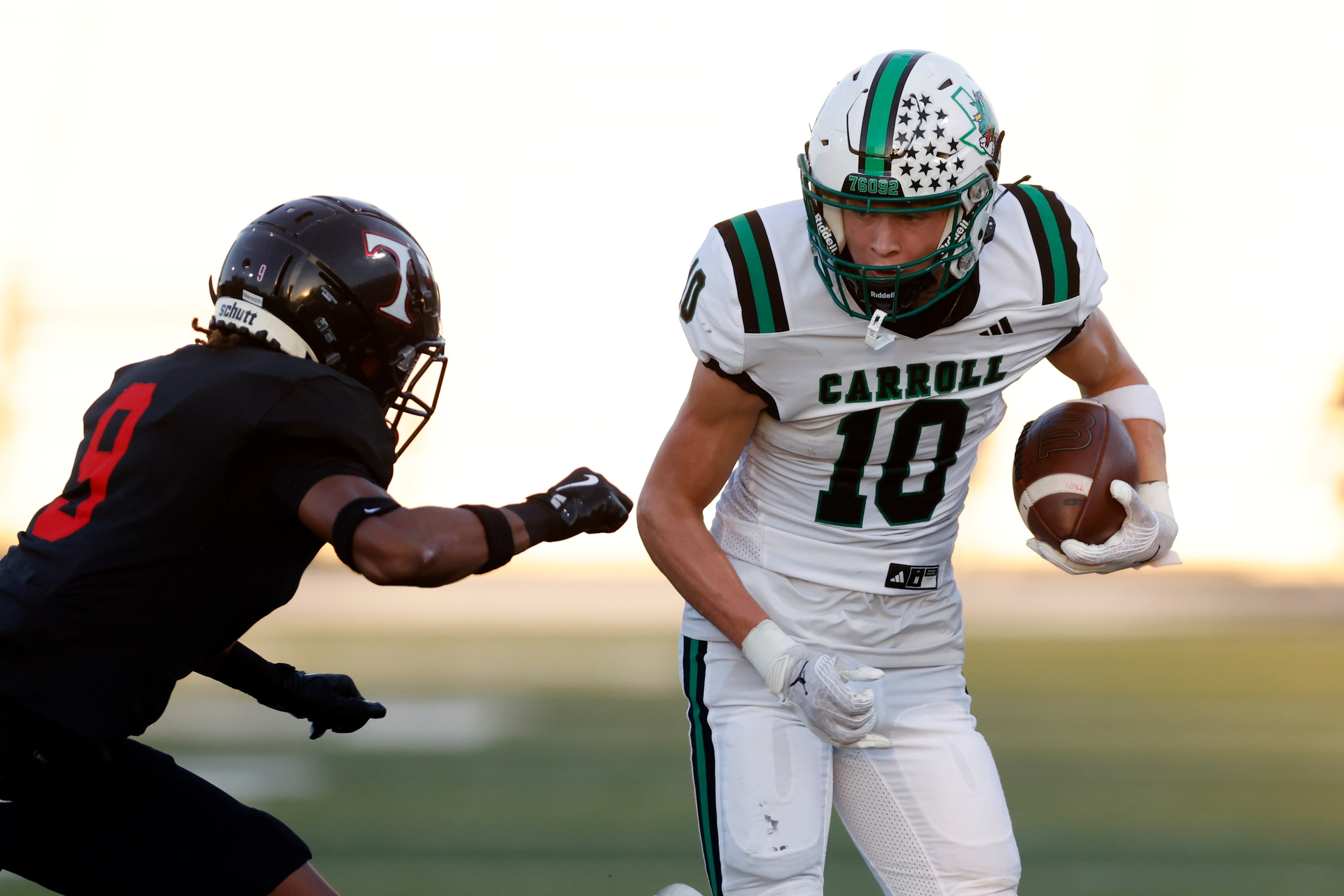 Southlake Carroll wide receiver Brody Knowles (10) runs past Euless Trinity defensive back...